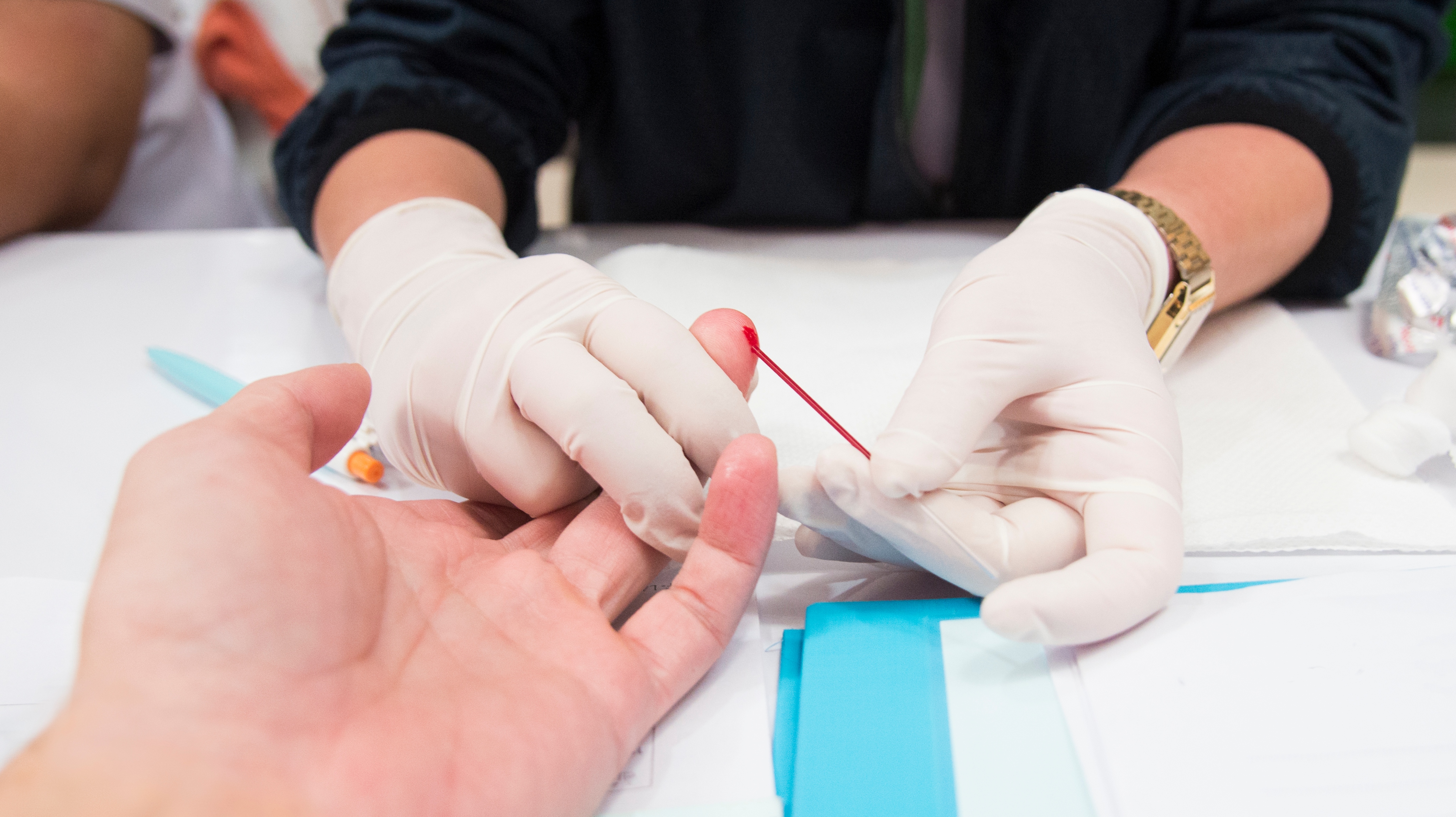 blood drop for blood testing.Nurses collect blood from blood donor for blood donation